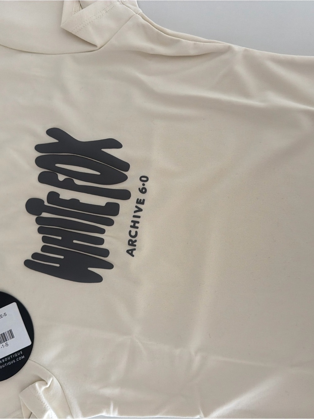 White Fox Boutique Cream Short Sleeve Tee with Black Logo